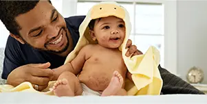 dad with baby with eczema
